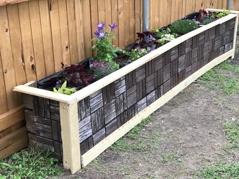 Planter box made from floor recycled deck floor tiles Tiled Planter Outdoor, Tiled Planter Boxes, Tile Planters Diy, Raised Planter Box With Legs Trees, Recycled Decking, Mosaic Tile Planter, Large Planter Boxes, Diy Tile, Front Entry