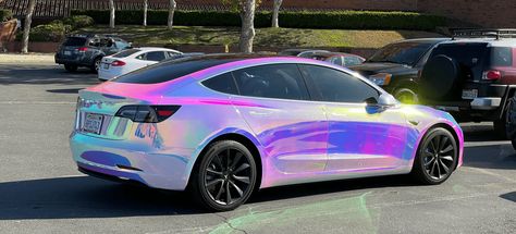 Tesla Model 3 Shows Off Cool Rainbow, Holographic Wrap - TeslaNorth.com Tesla Wrap, Holographic Car, Galaxy Car, Tesla Electric Car, Expensive Sports Cars, Car Paint Jobs, Tesla Ceo, Rainbow Holographic, Tesla Owner