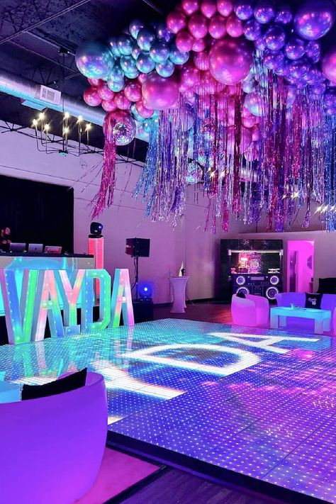 Check out this fantastic disco Sweet 16! The decor is amazing!! See more party ideas and share yours at CatchMyParty.com Club Themed Sweet 16, Theme Sweet 16 Ideas, Sweet 16 Night Club Theme, Sweet 16 Stage Decor, Disco Party At Home, Sweet Sixteen Disco Party, Disco Party Sweet 16, Sweet 16 Birthday Party Decorations, Purple Theme Sweet 16