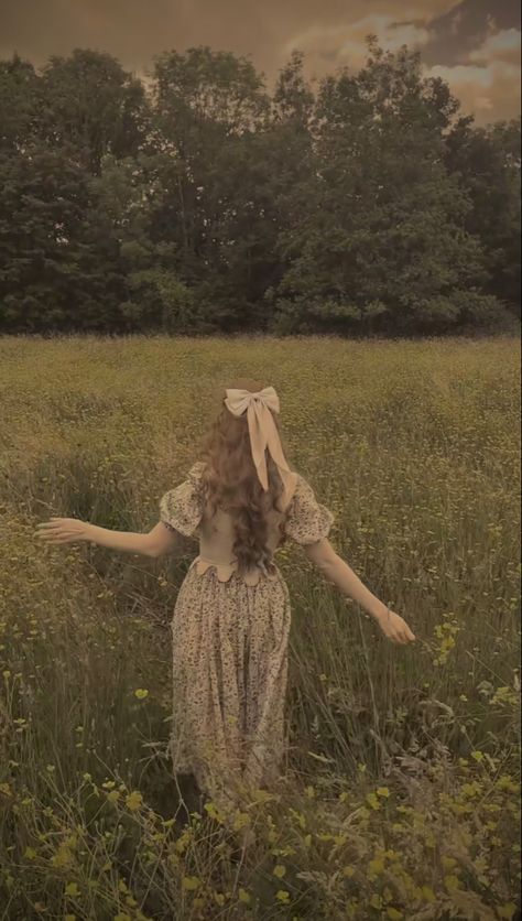 yellow flowers, fields, summer, spring, sundress, summertime aesthetic Walking Through A Field, Flower Aesthetic Landscape, Frolicking In A Field Aesthetic, Pose Reference Lighting, Walking In Flower Field, Running Through Field Aesthetic, Woman In Flower Field, 1800s Love, Frolicking Dress