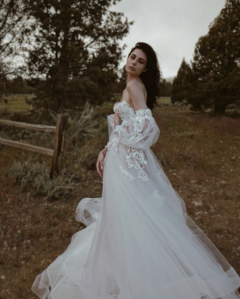 “Love is a canvas furnished by nature, and embroidered by the imagination.” ~ Voltaire “PASTORA” gown from our WILDBLOOM Collection 🌸 She’s a romantic guipure lace bustier ball gown with layers of tulle and organza and waterfalls of delicate hand appliqués. Customize “Pastora” in unlimited ways, and pair with accessories like detachable sleeves. Now available for fittings at our LA Flagship and a upcoming trunk shows! Call/text 310.595.1101 to book or with any questions! #PASTORAgown... Lauren Elaine Bridal, Detachable Sleeves, Lace Bustier, Guipure Lace, Ball Gown, A Romantic, Trunk, Ball Gowns, Lace