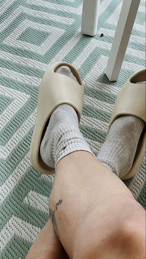 Comfort in yeezy slides by Kanye West. Styled for extra comfort with nike socks! Kanye West Slides, Adidas Kanye West, Kanye West Adidas, Yeezy Slides, Nike Socks, Kanye West, Heeled Mules, Mule Shoe, Slides