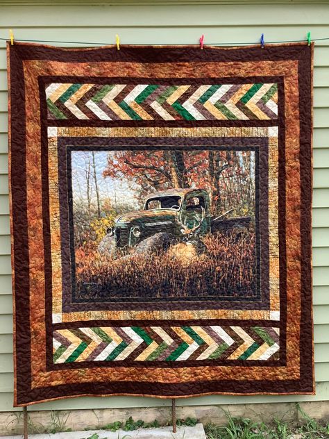 Truck and a Buck panel quilt.  Wonderful gift for the outdoors person in your life.  Quilt measures 60" wide by 68" long.  Beautiful browns, oranges, greens and golds make up fall woodsy scene.  Pieced borders including french braid rows on top and bottom to add color.  Quilt top and back are all cotton and the batting is a low loft polyester making it light weight but warm. Machine pieced and quilted for durability. Bear Panel Quilt Ideas, Quilt Patterns Western, Quilts With Borders, Panel Quilting, Quilting Panels, Big Prints, Deer Quilt, Wildlife Quilts, Beginner Quilting