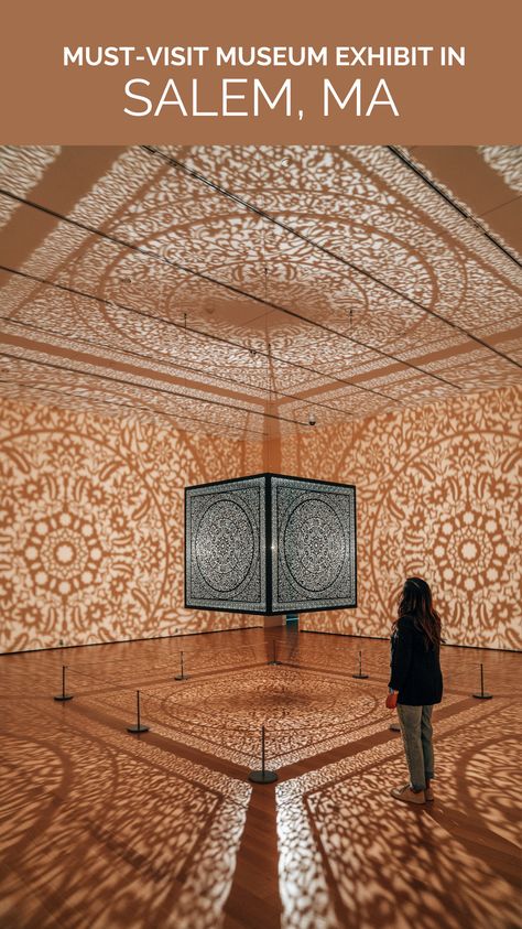 Did you know this magical exhibit is located in Salem, MA at the Peabody Essex Museum? 🕋✨ [All The Flowers Are For Me, by Anila Quayyum Agha] An empty room is transformed into a sacred space filled with beauty & elegance. A 600 pound laser-cut steel cube suspended from the ceiling and illuminated by a single bulb casts intricate shadows across the walls & all the people who enter the gallery! Peabody Essex Museum, Salem Art, Museum Exhibit, Laser Cut Steel, Salem Ma, Empty Room, Museum Exhibition, Sacred Space, The Gallery