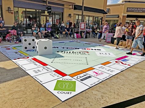 Visited the @outletsoflr during their 1-year anniversary celebration, which included prize giveaways while playing a giant Monopoly game. The Outlets was designed by HFA's Boston team and features level, covered walkways and plenty of outdoor seating to relax or people-watch. Stop by and see it sometime! It's located off Interstate 30 next to Bass Pro Shop. Giant Monopoly Game, Anniversary Event Ideas, Giant Monopoly, Covered Walkways, Life Size Games, Pep Rally Games, Integrated Architecture, Experiential Marketing Events, Event Games