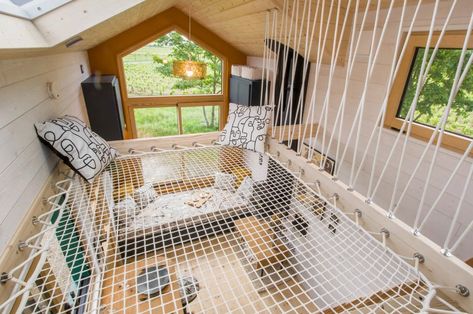 French Tiny Home Has A Netted Loft Area Under A Skylight That Functions As A Cozy Reading Nook Loft Area, Tiny House Company, Reading Space, Cozy Loft, Aluminium Cladding, Micro House, Big House, Cozy Reading Nook, Cozy Reading