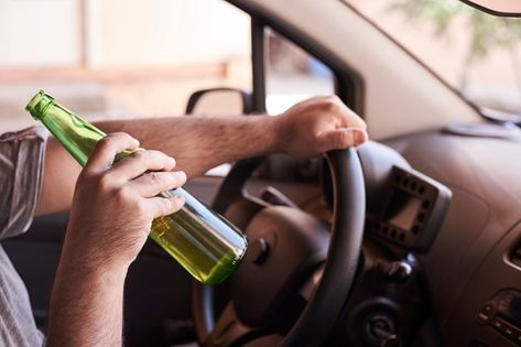 Drunk driving. impaired driving Premium ... | Premium Photo #Freepik #photo #car #man #beer #road Sleeping In Your Car, Buying New Car, Drunk Driving, How To Lean Out, Corporate Law, Employment Law, Under The Influence, Personal Injury, School Projects