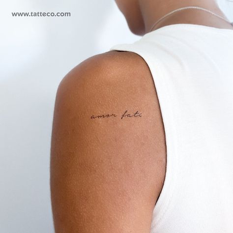 Amor fati temporary tattoo. Nº of tattoos 3 Size 1.3 in / 3.4 cm (width) Small Inner Hip Tattoos Women, Mini Collar Bone Tattoo, Love Symbol Tattoos Unique, Amore Fati Tattoo, Amor Fati Tattoo Fonts, Mini Back Tattoo, Writing Tattoos For Women, Italian Tattoos For Women, Amor Fati Tattoo