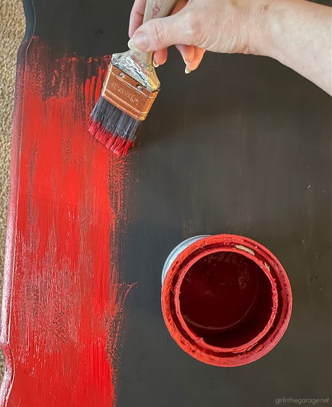 Bold red painted table with Chalk Paint and clear and black wax for drama. DIY tutorial by Girl in the Garage Red Distressed Furniture, Red Chalk Paint, Coffee Table Makeover, Painting Antique Furniture, Black Chalk Paint, Chalk Paint Colors, Antique Wax, Red Table, Black Chair