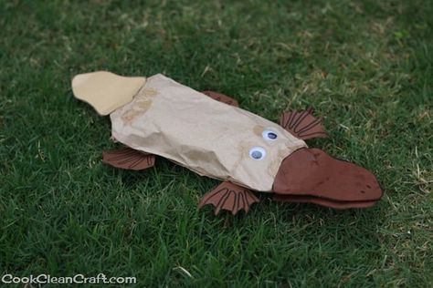 Paper bag Perry the Platypus craft (6) Platypus Craft, Australia Activities, Paw Template, Wombat Stew, Australia For Kids, Cheap Craft Supplies, Australia Crafts, How To Make A Paper Bag, Yellow Crafts