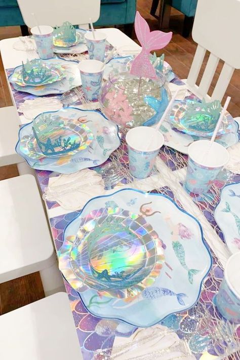 Take a look at this beautiful under the sea birthday party! The table settings are gorgeous! See more party ideas and share yours at CatchMyParty.com Mermaid Birthday Party Ideas, Mermaid Pool Parties, Sea Party Ideas, Under The Sea Birthday Party, Ocean Birthday Party, Mermaid Theme Birthday Party, Mermaid Kids, Birthday Party Snacks, Under The Sea Birthday