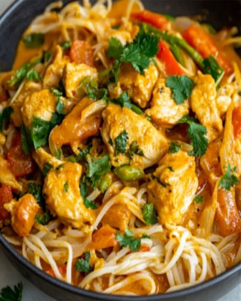 Savor the deliciousness of creamy coconut curry chicken with rice noodles. Quick to prepare, this dish is a perfect blend of spices Coconut Curry Ramen Noodles, Coconut Curry Noodles Recipe, Rice Noodle Curry, Chicken With Rice Noodles, Yellow Curry Chicken, Quick Chicken Curry, Creamy Coconut Curry, Chicken Rice Noodles, Thai Coconut Chicken