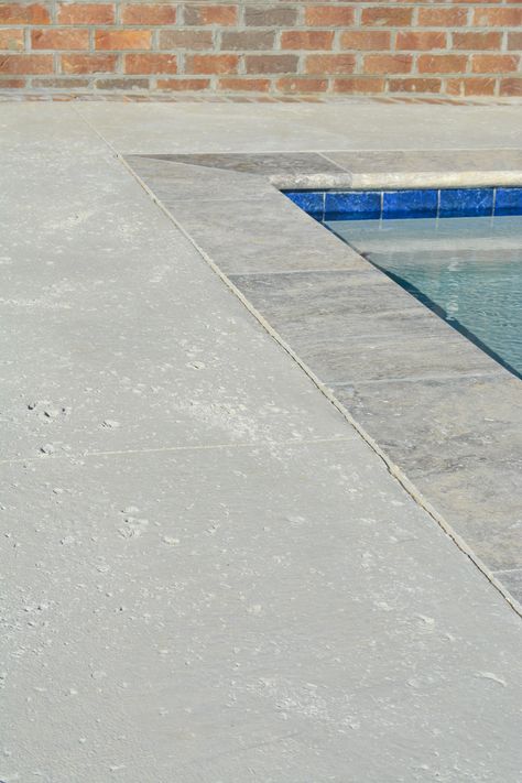 Salt Finished Concrete Pool Deck and Natural Stone Coping Travertine Grey Blue Swimming Pool Tile All Tile Pool, Travertine Pool Coping With Concrete Decking, Bluestone Coping Around Pool, Natural Stone Coping Around Pool, Salted Concrete Pool Deck, Salt Concrete Finish, Swimming Pool Coping Ideas, Travertine Coping Around Pool, Shellstone Pavers Pool