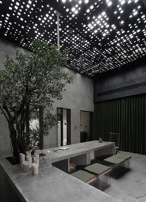 liang architecture's studio in china combines concrete with greenery Concrete Design Interior, Traditional Office Design, Brutalism Interior, Brutalist Interior, The Dream Life, Skylight Design, Industrial Cafe, China Architecture, Brutalist Buildings