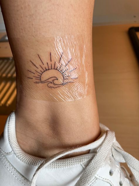 Just got my first tattoo! I’ve been pinning tats like this for years and finally got it for my 21st birthday. 🌊☀️ Chronic Ink Toronto Orange Ink Tattoo, Wave Sun Tattoo, My 21st Birthday, Sun Tattoo, First Tattoo, Leaf Tattoos, 21st Birthday, Maple Leaf Tattoo, Got It