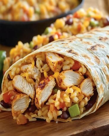 Taco Bell Chicken Burrito Recipe - Easy & Delicious Meal Taco Bell Chicken Burrito Recipe, Chicken Bean Rice Burrito, Cantina Chicken Burrito, Been Burrito Recipe, Burrito Chicken Recipe, Leftover Chicken Burritos, Chicken Burrito Recipe Easy, Taco Bell Chicken Burrito, Meal Prep Burritos