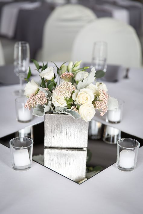 Flowers And Mirror Centerpiece, White And Silver Floral Centerpieces, Square Mirror Centerpiece Wedding, Silver Centerpiece Wedding, Mirror Centerpiece Wedding, Mirror Centerpiece Ideas, Coquette Quinceañera, Mirror Wedding Centerpieces, Prada Wedding