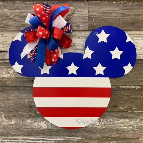 8 Patriotic 4th of July and Memorial Day Wreath Ideas for Your Front Door Mickey Door Hanger, Mickey Mouse Crafts, Carved Ornaments, Mickey House, Mickey Mouse Decorations, Patriotic Door Hanger, American Flag Wreath, Rose Cookies, Flag Wreath