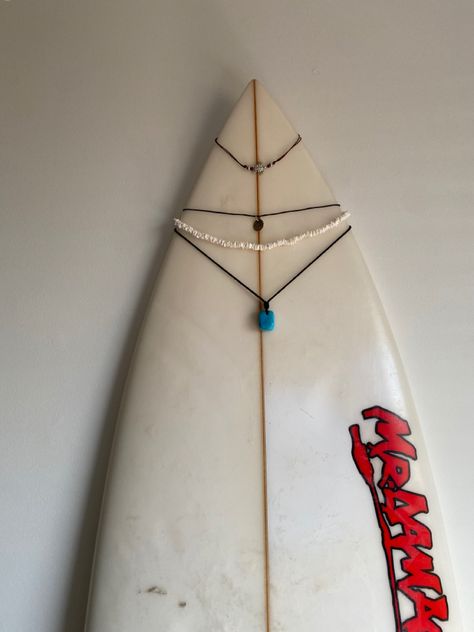 #surfergirl #necklace #surfboard #jewelry #necklaceorganization #surf #beachvibes #beach #summer Surfboard Jewelry, Surfboard Necklace, Beach House Room, Salted Granola, Surf Necklace, Necklace Hanger, Surf Jewelry, Cat Summer, Dream Beach Houses