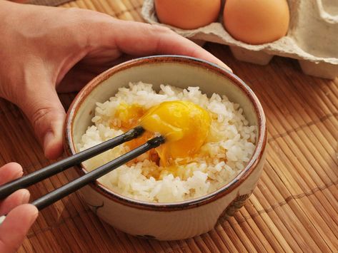 Tamago gohan—rice mixed with a raw egg—was one of the very first recipes I learned, and it's Japanese comfort food at its simplest. All it takes is a bowl of rice and an egg to break into it, perhaps seasoned with a little bit of soy sauce, salt, and MSG. Whip up the rice with chopsticks and the egg will turn pale yellow and foamy, holding the rice in a light, frothy suspension. Egg Rice Recipe, Egg Rice, Japanese Egg, Arroz Frito, Japanese Rice, Japanese Cooking, Japanese Dishes, Cooking Inspiration, Rice Recipe