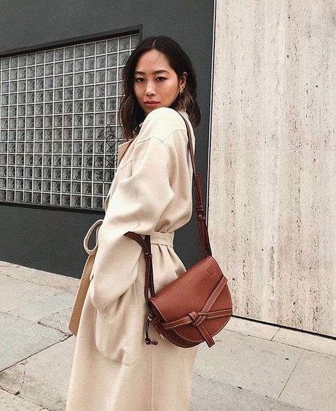 The Gate Shoulder Bag by #Loewe is the perfect fall bag with a fold over top knotted front belt detail and adjustable shoulder strap. Shop @songofstyles look at italist.com #italisticon #italist Loewe Gate Bag, Vetements Hoodie, Song Of Style, 7 Habits, Everyday Wardrobe, Modest Fashion, Stylish Women, Spring Fashion, Timeless Fashion