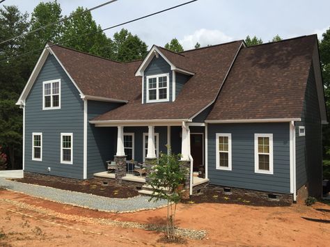 Blue craftsman home, James Hardie Evening Blue, brown roof, ledgestone, pea gravel walkway Brown Metal Roof, House Color Combinations, Blue Siding House, House With Brown Roof, Brown Roof Houses, Siding House, Home Art Studios, Brown Roofs, Blue Siding