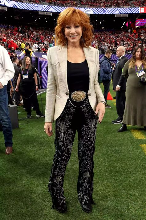 See Reba McEntire's Outfit for Super Bowl 2024 National Anthem Performance Glittery Outfits, Sheridan Wyoming, Blue Cowboy Boots, Fringe Pants, Fringe Jeans, Singing Competitions, Reba Mcentire, Rodeo Life, Chance The Rapper