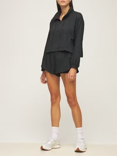 11 Best Luxury Loungewear Brands For Comfort And Style Finding A Girlfriend, Half Zip Windbreaker, Luxury Loungewear, Girlfriend Collective, Loungewear Luxury, High Collar, Half Zip, Zip Pockets, Black Women