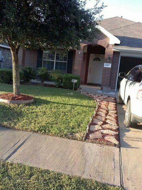 I want to do a rock walk for us next to our driveway like this. A friend of ours did this one and it looks really good. I'm thinking we need the extra walkway space for us. Walking Path Next To Driveway, Walkway Beside Driveway, Flagstone Driveway Extension, Pathway Next To Driveway, Path Next To Driveway, Landscape Pavers Ideas Walkways, Pavers Next To Driveway, Extend Driveway Ideas, Walkway Next To Driveway