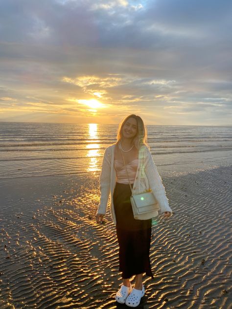 Brown satin maxi skirt, beige thrifted sweater, crocs, ysl bag Skirt With Crocs, Brown Crocs Outfit, Summer Beige Skirt For Beach, Spring Beach Skirt In Beige, Beige Crocs Outfit, Beige Maxi Skirt For Beach Wear, Casual Beige Beach Skirt, Beach Maxi Skirt In Beige, Crocs Outfit