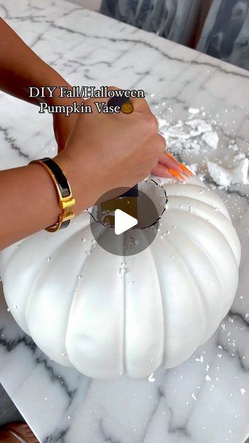 Tamara Bradshaw on Instagram: "DIY FALL/HALLOWEEN PUMPKIN VASE. What do you rate this btwn a 1 & a 10??!🎃

Guys if you love this DIY please comment, like, and share! Love you boos😘

Foam Pumpkin, extra fine gold glitter, spray paint: Hobby Lobby✨

Vase: Dollar Tree✨

Fresh Flowers: Local Grocery Store✨

Carve out pumpkin. Take all the foam out. Spray paint pumpkin color of your choice. Let dry outside for a couple hours. Fill bucket with water. Spray the spray paint into the water. I used gold and white spray paint. Add extra fine gold glitter to water. Stir. Dip pumpkin in and out of water creating the design you like. Let dry for 24 hours. Insert vase into pumpkin. Style. The End😬

#diyhomedecor #diydecor #diyideas #diyhome #falldecor" Fill Bucket, Gold Glitter Spray Paint, Bucket With Water, Paint Pumpkin, Pumpkin Patch Corn Maze, Glitter Spray Paint, Pumpkin Stencils, Pumpkin Vase, Holiday Deco