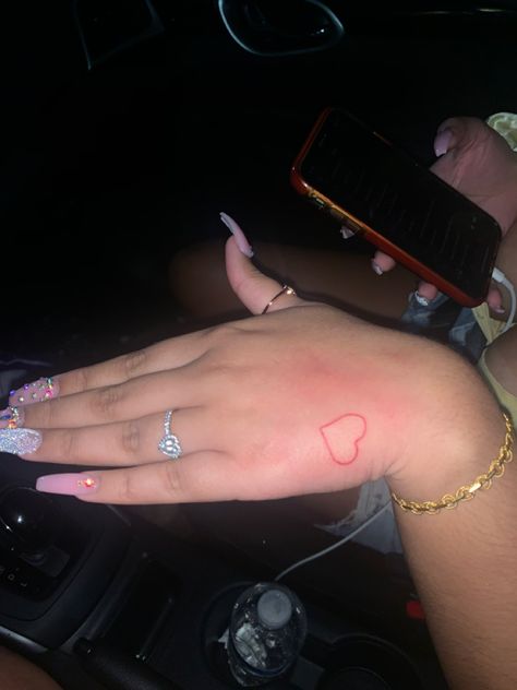 Red Heart Tattoo On Hand, Red Heart Hand Tattoo, Heart On Hand Tattoo, Red Ink Heart Tattoo, Chrome Heart Tattoo, Heart Tattoo On Hand, Heart Hand Tattoo, Finger Heart Tattoo, Red Hand Tattoo