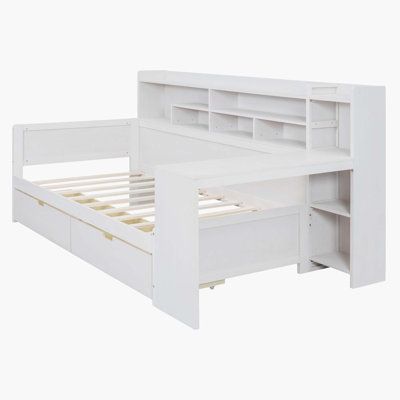 Product Features Multifunctional design: This bed boasts a multifunctional design that is tailored to meet various needs. With its multi-layer storage shelves on the side, two spacious drawers at the bottom, and a study desk at the foot of the bed. The bed is designed with a modern aesthetic, featuring clean lines and sleek finishes that effortlessly complement various bedroom styles. Bed Frame with Study Desk: This bed comes with a unique feature - a study desk at the foot of the bed. Transform Twin Size Bed With Storage, Kids Bedroom Shelving Ideas, Twin Daybed With Storage, Functional Bed, Desk Antique, Twin Size Daybed, Wooden Daybed, Bed Frame With Drawers, Wood Bed Design