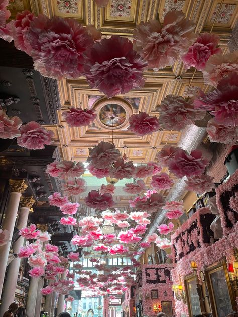 Flowers Hung From Ceiling, Flowers From The Ceiling, Orchid Chandelier, Unusual Interiors, Pink Ceiling, Flower Ceiling, Ceiling Draping, Flower Lamp, Teeth Jewelry