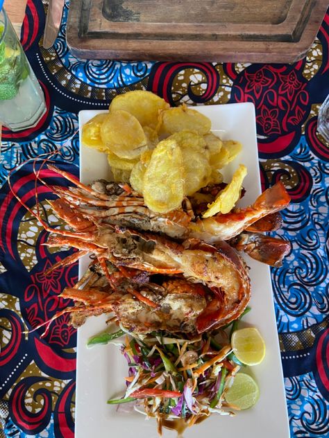 Seafood platter in Zanzibar at the rock restaurant The Rock Restaurant Zanzibar, Zanzibar Food, Rock Restaurant, Seafood Platter, Summer Bucket, Travel Aesthetic, Campfire, Tanzania, Chicken Wings