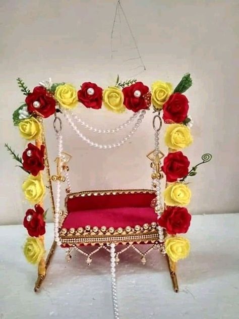 Decorate beautiful Janamashatmi jhula at Home and bring the blissful blessing of Bal Gopal at your home.  Pic Credit:-RMS art Ladoo Gopal Jhula Decoration Ideas, Krishna Jula, Jhula Decoration Ideas, Janmashtami Ideas, Jhula Decoration, Krishna Jhula, कृष्ण जन्माष्टमी, Home Pic, Thali Decoration Ideas