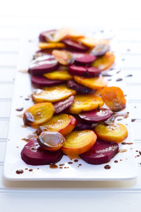 These bright and colorful Roasted Beets with Balsamic Glaze are a tasty and healthy side dish that will convert even the biggest beet hater. Vegan Thanksgiving Sides, Beet Recipes, Thanksgiving Dishes, Roasted Beets, Vegan Thanksgiving, Thanksgiving Sides, Balsamic Glaze, Eat Real Food, Thanksgiving Side Dishes