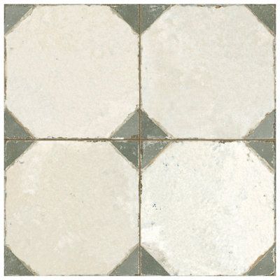 Capturing the appearance of a patterned look, our Kings Yard Ceramic Floor and Wall Tile provides decorative appeal that adapts to a variety of stylistic contexts, making it a great choice for your space. With its semi-vitreous features, this square tile is an ideal selection for indoor installations, including bathrooms, backsplashes, showers, hallways, entryways and fireplace facades. This tile is a perfect choice on its own or paired with other products in the Kings Yard Collection. Tile is t Statement Floor Tiles, Artisan Bathroom Tiles, Printed Kitchen Tiles, Tile Floor For Kitchen, Vintage Inspired Bathroom Tile, French Tile Kitchen, Merola Tile Kitchen, Sunroom With Tile Floor, Green Accent Tile Bathroom