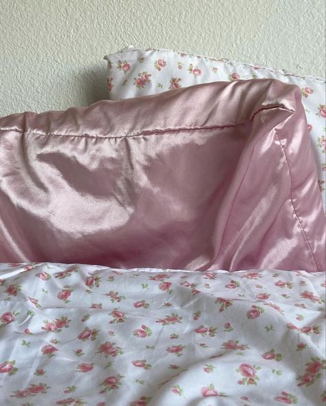 Satin Bedsheets Aesthetic, Pink Bedspread Dorm, Pink Satin Bed Sheets, Floral Bedsheets Coquette, Pink Silk Sheets Aesthetic, Pink Satin Sheets Aesthetic, Pink Pillow Case, Pink Floral Sheets Aesthetic, Cute Pillow Cases Aesthetic