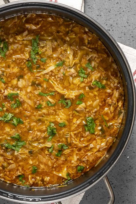 Unstuffed Cabbage Roll Soup is the lazy version for cabbage rolls. Tasty, hearty and super easy to make in one pot. #cabbagesoup #unstuffedcabbagesoup #stuffedcabbagesoup #cabbagerollsoup Unstuffed Cabbage Soup, Unstuffed Cabbage Roll Soup, Baking Tricks, Unstuffed Cabbage, Cabbage Roll Soup, Cabbage Roll, Food Baking, Beef And Rice, Soups Stews