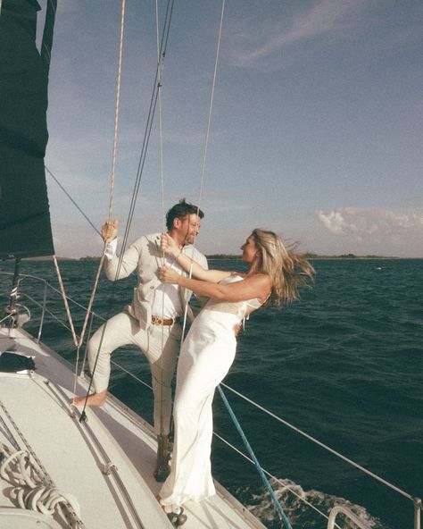 from the archives: the stunning sailboat session I shot this summer ⛵️ with the sweetest couple. What’s your fav? • • • • Keywords: storytelling cinematic engagements sailboat proposal couples Tampa St. Petersburg #tampaproposal #stpeteproposal #tampaengagement #stpeteengagement #stpetephotographer #tampaphotographer #storytellingphotographer #cinematicphotographer #tampaelopement #stpeteelopement @scrlgallery #scrl #scrlgallery Couple On Sailboat, Sailboat Wedding Photos, Sailboat Engagement Pictures, Coastal Engagement Photos, Sailboat Photos, Sailboat Photoshoot, Cruise Photography Ideas, Sailboat Proposal, Boat Engagement Photos