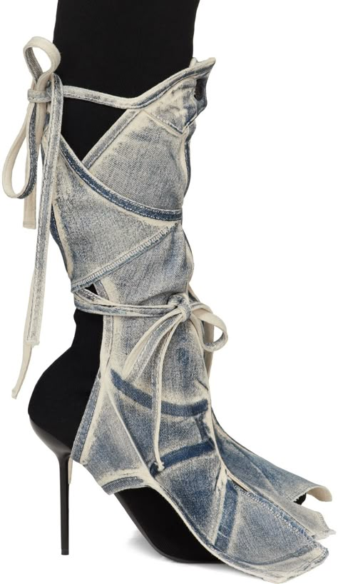 Handcrafted stretch denim leg wraps in blue. Cut-outs, raw edges, and trompe-l'oeil graphic printed throughout. · Self-tie and button fastening · Vented flared cuffs Each item is unique. Please note finishings may vary. Available exclusively at SSENSE. Supplier color: Sand/Blue paint Bad Bunny Cowboy, Shose Design, Leg Wraps, Unique Jeans, Black Knee Boots, Unique Boots, Blue Boots, Color Sand, Denim Color