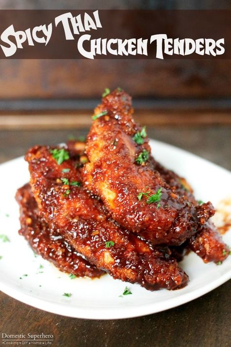 Spicy Thai Chicken Tenders are coated in panko, fried to perfection, then tossed in a delicious spicy Thai sauce. They are delicious and take less than 20 minutes from start to finish! Thai Chicken Tenders, Thai Sauce, Spicy Chicken Recipes, Spicy Thai, Chicken Tender Recipes, Easy Meal Plans, Thai Chicken, Flank Steak, Thai Food