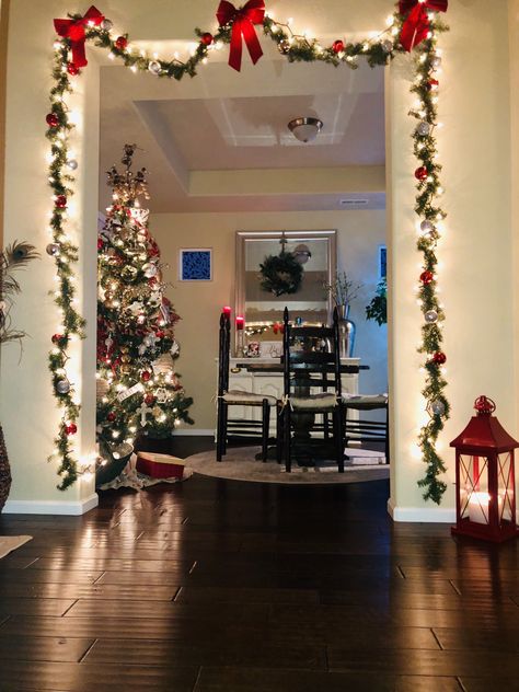 Garland Over The Door, Garland Christmas Door, Christmas Decor Doorframe, Christmas Garland Wall Decor, Christmas Decor Open Floor Plan, Christmas Garland Around Door Frame, Garland On Doorway, Christmas Garland Ceiling, Doorway Decor Christmas