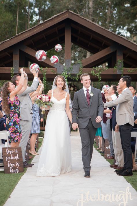 | unique wedding ceremony ideas | the bride was a volleyball player, so after their ceremony the guests tossed volleyballs up in the air | personalized wedding ideas | outdoor wedding ceremony ideas | weddings in houston | photo taken at THE SPRINGS Event Venue. follow this pin to our website for more information, or to book your free tour! SPRINGS location:  Stonebrook Hall in Lake Conroe, TX photographer:  J.W. Baugh Photography #brideandgroom #weddingceremony #weddingideas #weddinginspiration Volleyball Engagement Photos, Wedding Volleyball, Volleyball Wedding, Personalized Wedding Ideas, Outdoor Wedding Ceremony Ideas, Soccer Wedding, Wedding Ideas Outdoor, Unique Wedding Ceremony Ideas, Unique Wedding Ceremony