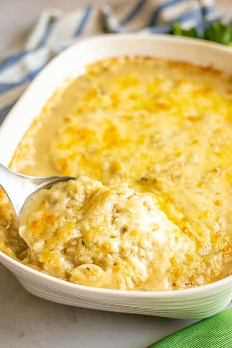 This baked chicken and rice casserole is creamy, cheesy, hearty and totally cozy. It’s great for an easy dinner the whole family will love. Baked Chicken And Rice Casserole, Baked Chicken And Rice, Cheesy Rice, Chicken And Rice Casserole, Creamy Chicken And Rice, Chicken Rice Casserole, Rice Casserole Recipes, Food On The Table, Baked Rice