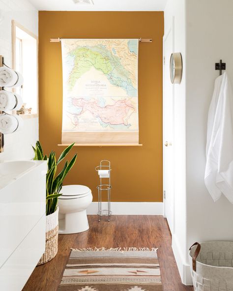 25 of Our Favorite Paint Colors for Home Interiors | construction2style Yellow Gold Paint Colors For Walls, Tumeric Wall Color, Mustard Wall Paint Bedroom, Tumeric Paint Color Walls, Turmeric Wall Color, Mustard Color Bathroom Ideas, Mustard Bathroom Walls, Golden Yellow Bathroom Ideas, Behr Mustard Yellow Paint Colors