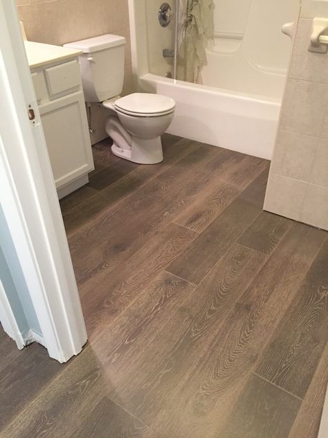 Engineered hardwood installed in a bathroom by Hampton Flooring Center. Hampton Flooring, Hamptons Flooring, Wood Flooring Kitchen, Bathroom Interior Design Wood, Waterproof Wood Flooring, Hardwood Floors In Bathroom, Bathroom Design Wood, Wooden Bathroom Floor, Best Wood Flooring