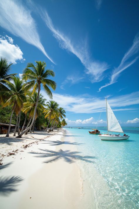 Escape to paradise at Boracay White Beach! 🏝️ This stunning Philippine island boasts powdery white sand, crystal clear turquoise waters, and iconic paraw sailboats. Perfect for a tropical getaway!