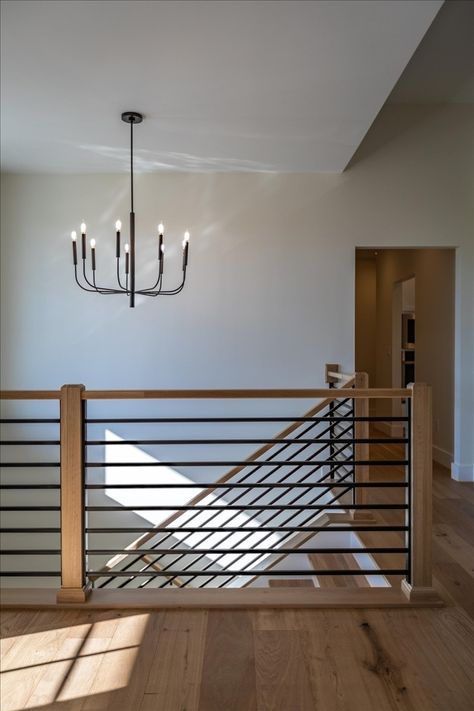 Banisters And Railings Horizontal, Stair Railing Trends 2023, Wood Stair Railing Ideas Modern, Stairs Horizontal Railing, Stairs Rails Ideas, Horizontal Indoor Railing, Hand Rails For Stairs Modern Interior Design, Black Horizontal Railing, Stair Railing Ideas Horizontal